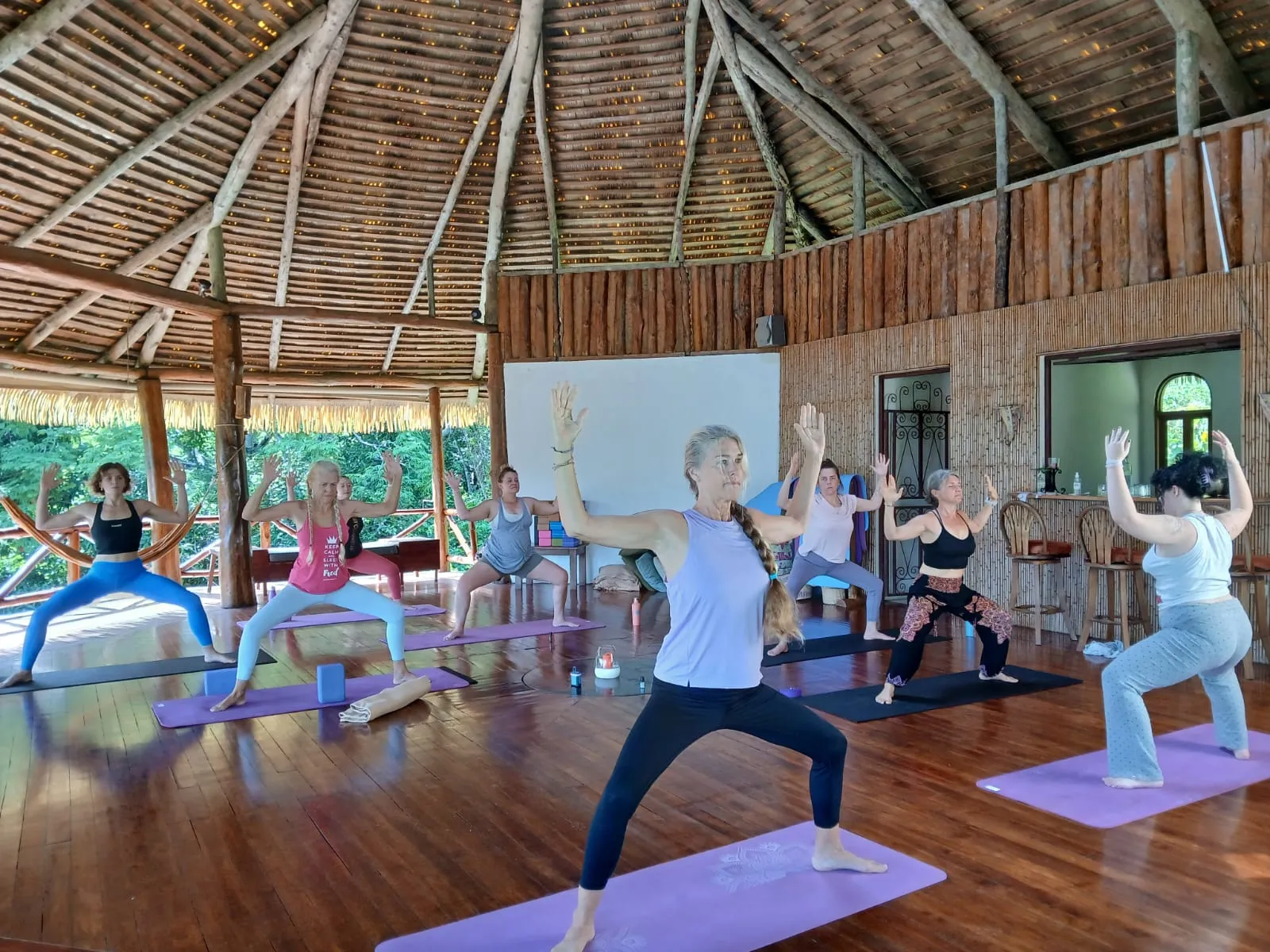 Yoga retreat class inside the AmaTierra pavilion